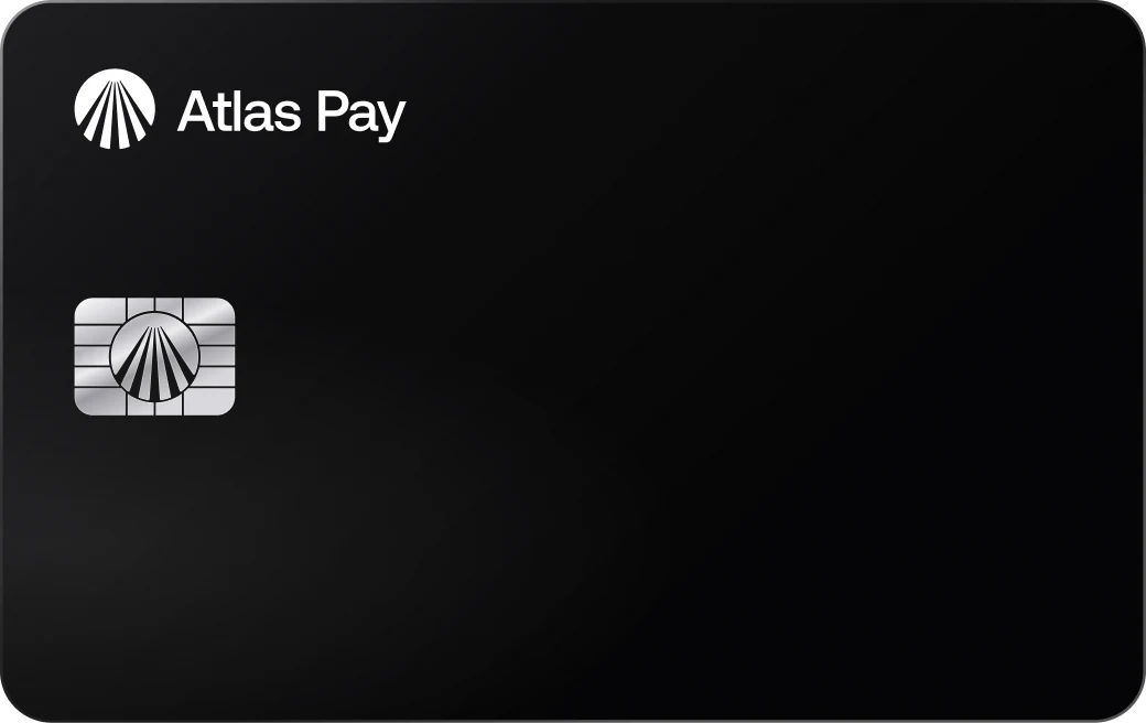 The physical Atlas Pay card: black metal with the lockup and the custom silver chip