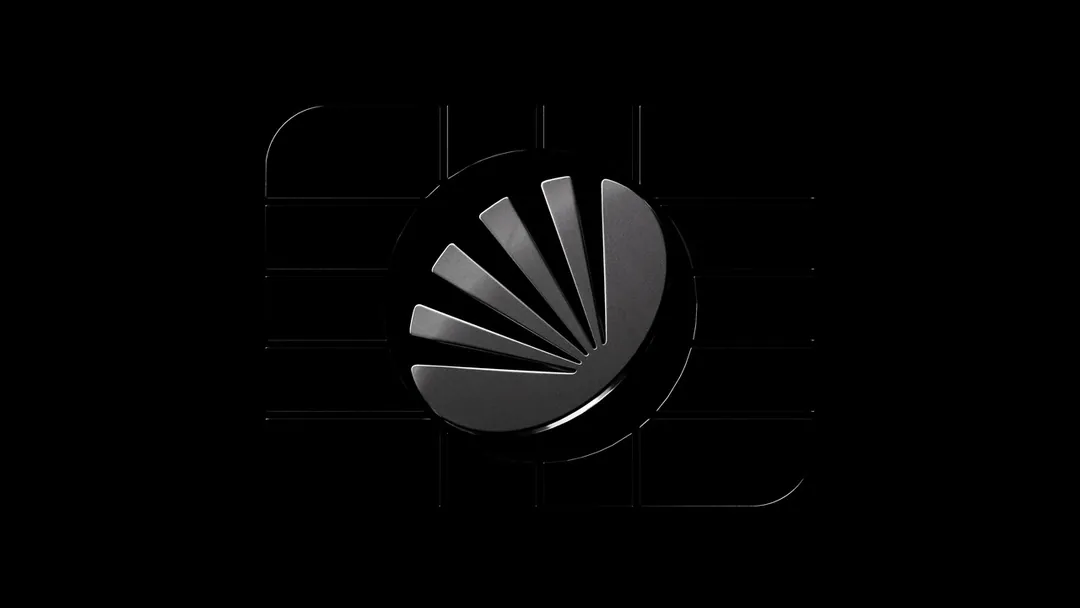 The Atlas Pay mark in relief on the chip, in near darkness