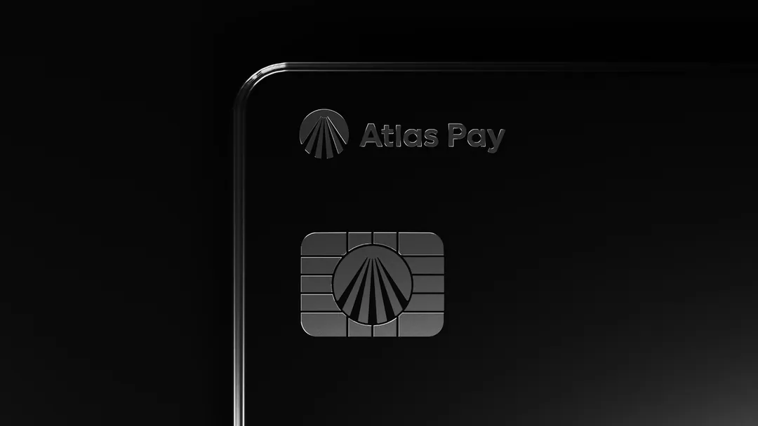 Corner of the black Atlas Pay card catching a line of light